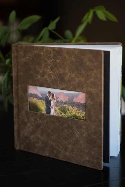 Custom wedding album designed for a couple married at Garden Of The Gods Club