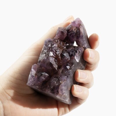This raw amethyst cluster is a truly breathtaking piece that is perfect for any crystal collector. The natural crystalline structure of the amethyst contains powerful energy, providing numerous healing benefits and calming energy. It is ideal for meditation, home décor and display, or giving as a thoughtful gift.