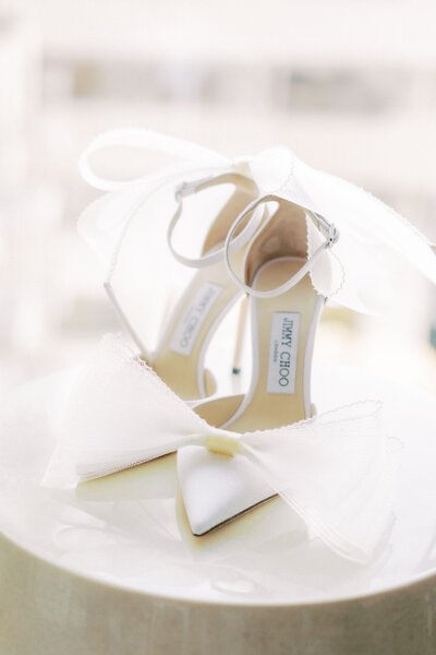Fine art wedding photography of. bride's Jimmy Choo white heels