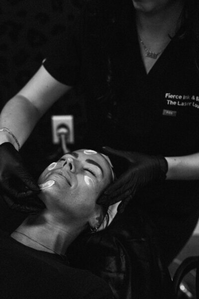 Professional laser facial performed in a high-end Pittsburgh laser lounge for skin rejuvenation and radiance.