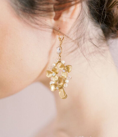 Elegant golden floral bridal earrings, jewelry by Joanna Bisley Designs, romantic and modern wedding jeweler based in Calgary, Alberta.  Featured on the Brontë Bride Vendor Guide.
