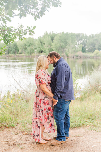 Couple has forehead to forehead at Golden Ponds in Longmont Colorado