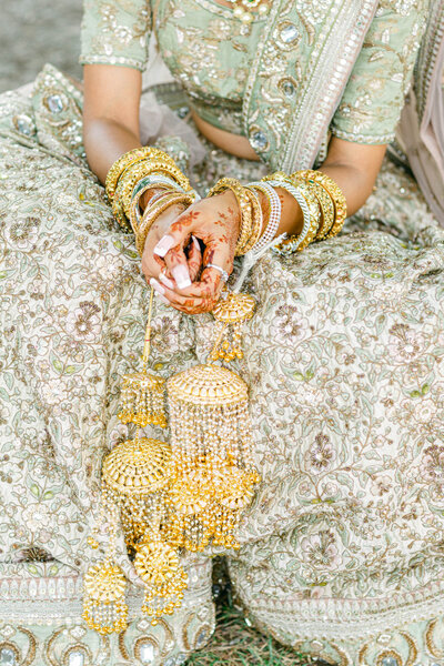 Bengali bride with bracelets and other details