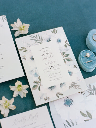 wedding invitation suite flatlay with details