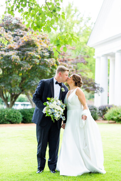 bride and groom hugging