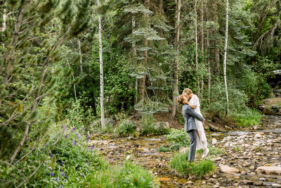Wedding couple in Utah snuggling for wedding videographer