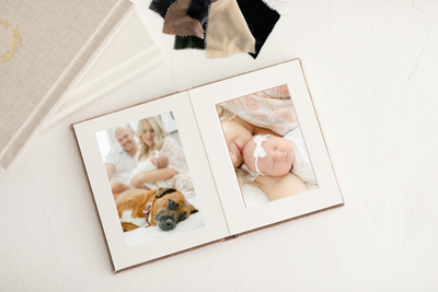 Matted heirloom album with newborn session images available from Indianapolis newborn photograpehr
