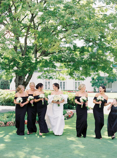 candid photo of bridesmaids walking