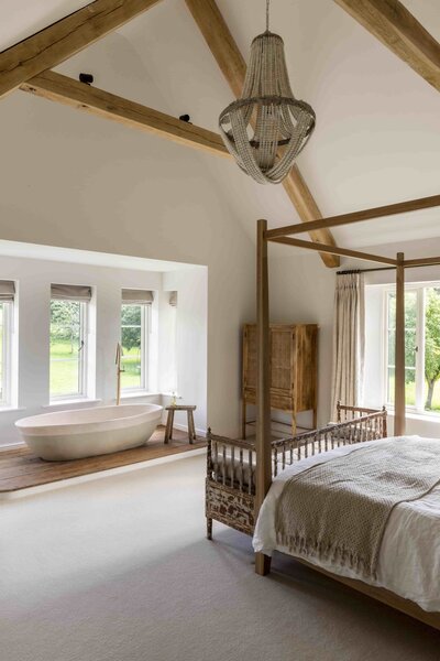 luxury cheltenham bedroom with four poster bed and ceramic bath