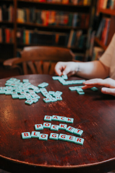 Scrabble letters spell back pocket blogger