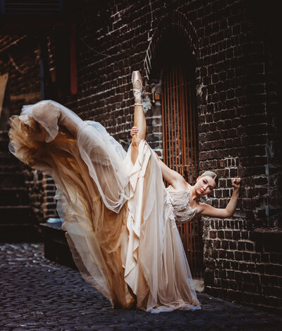 Fierce dance portrait in white flowy gown