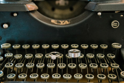 Wedding Ring Sits on Vintage Typewriter | Tucson Wedding Photographer