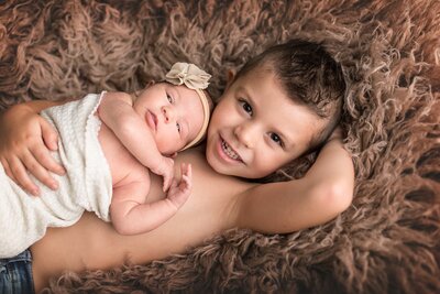 Your babies are just meeting each other. . . capture the moments in portraits