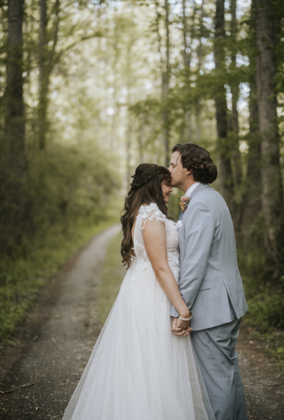 couple kissing during wedding of north georgia