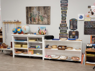 Cloverdale Montessori classroom shelves with educational supplies and toys