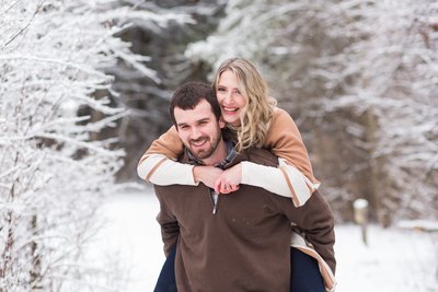 snowy winter engagement session quail hollow park photographed by jamie lynette photography canton ohio photographer