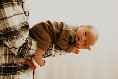 Studio Lifestyle Newborn photographer in Rochester, MN for Rhett and family.