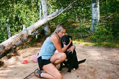Kristina and her dog enjoy hiking
