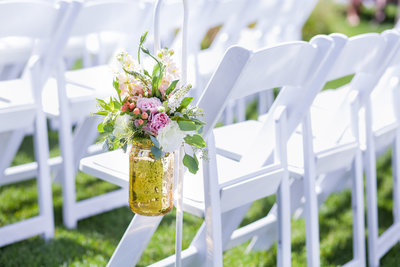 Gold  mason jar wedding ceremony with blush floral decor | Susie Moreno Photography