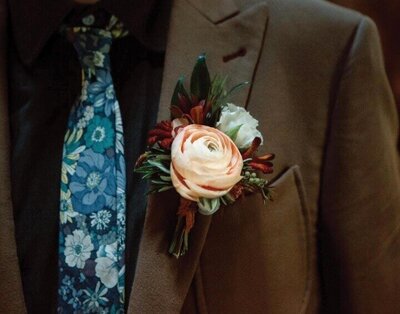 Ranunculus boutonniere for wedding.