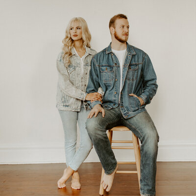 For this winter engagement photoshoot the couple decided to go to a white studio for their photos. Their all denim outfits were such a fun modern vibe for the shoot.