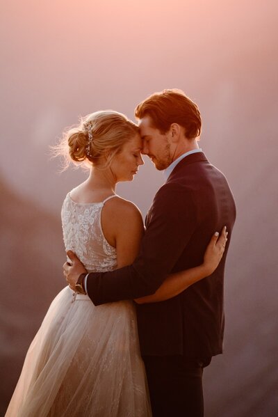 Bride and groom in Yosemite at Taft Point