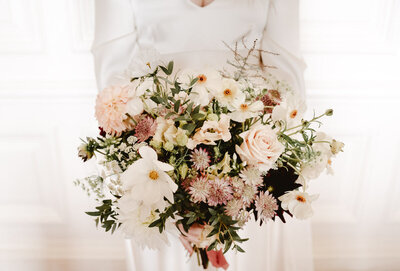 brides white bouquet of flowers