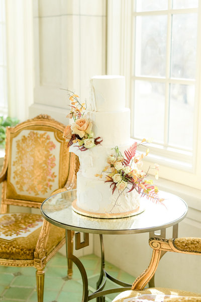 Elegant wedding cake adorned with flowers