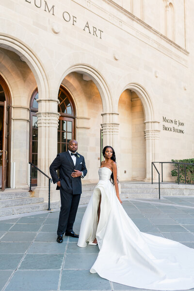 bride and groom in front of Chrysler Museum