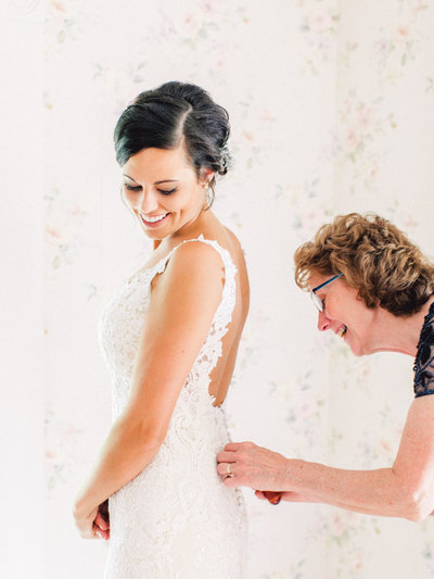 Bride and her mom getting ready