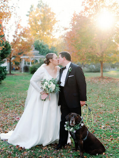 A couple and their dog in from of Rosemont Manor in Berryville, Va.