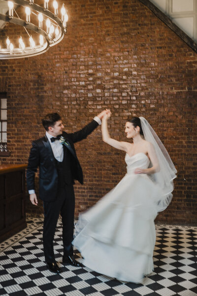Groom dips bride for a ceremony exit kiss