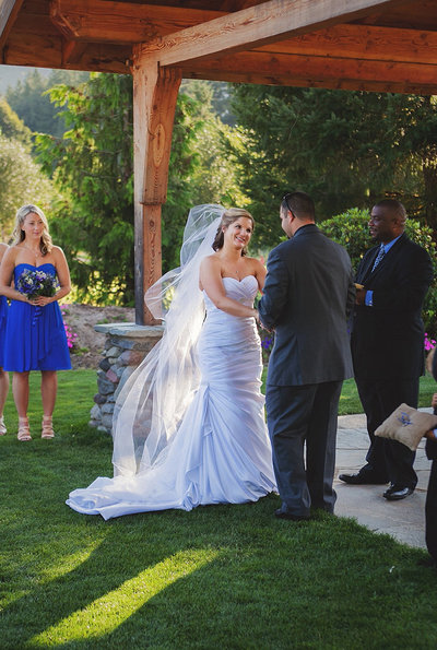 Portrait of OR bride and groom exchanging vows | Susie Moreno Photography