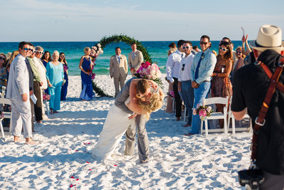 Groom and Bride Kiss at the End of their Destin Florida Destination Wedding Ceremony