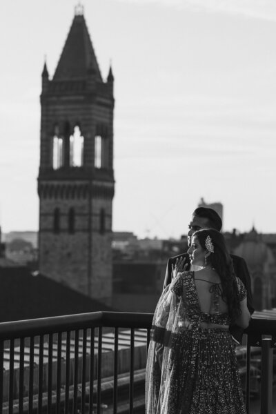 B & W photo of couple on a rooftop - UME (New England Wedding Planners) were wedding vendors