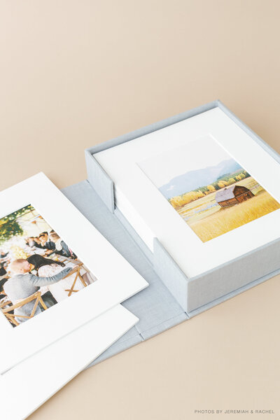photo of matted print box with sample baby images provided by Sacramento Newborn Photographer Kelsey Krall
