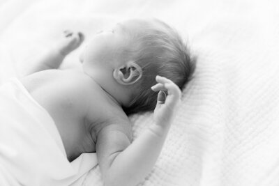 Black and white newborn photo of a baby girl by Indianapolis newborn photographer, Katelyn Ng