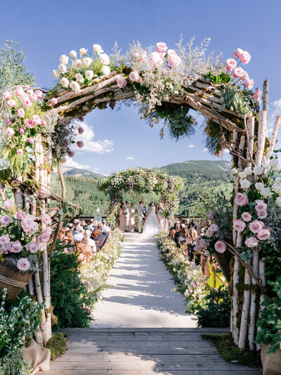 We love outdoor ceremony sites, especially when they have a forest as a backdrop.