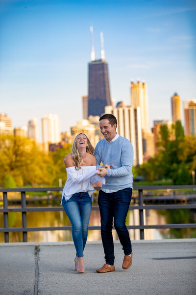laughing-engagement-photo-cafe-brauer-city-fall