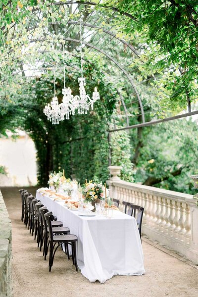 Intimate wedding reception table in Tuscany style