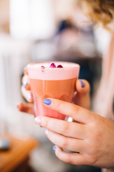 selective-focus-photo-of-person-holding-cup-879818