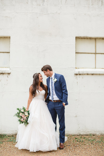 Bride and groom walk up memorial steps at their DC wedding