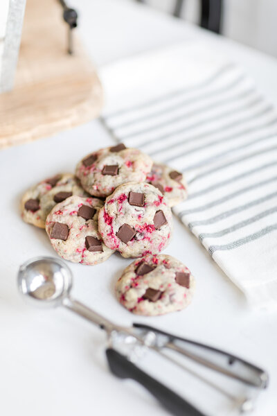 Group of chocolate raspberry cookies which is one of Nicole's favorite desserts that she always brings along for each elopement.