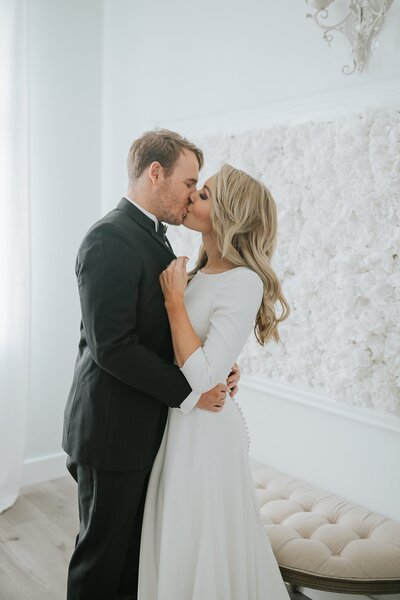 Sacramento Wedding Photographers capture bride and groom kissing