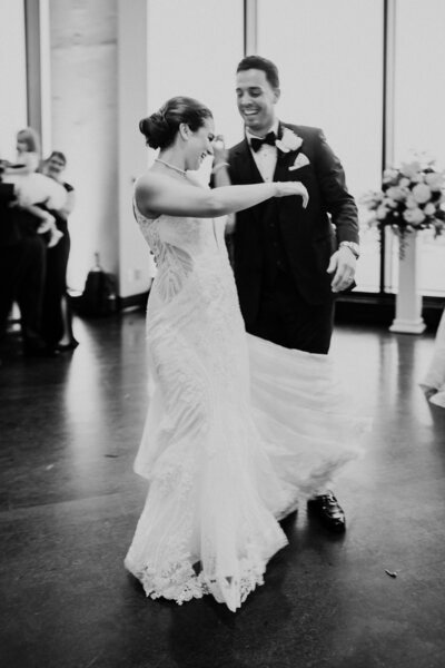 Elegant bride and groom dancing at their wedding