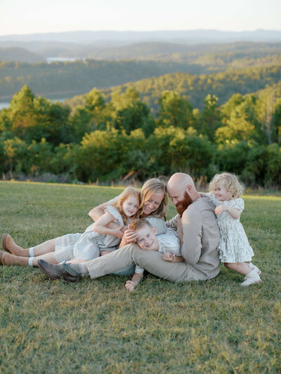 family hanging out at sunset by Knoxville Wedding Photographer, Amanda May Photos