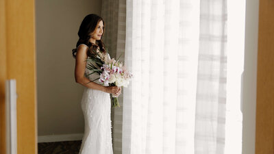 A bride and her bouquet ready for her wedding ceremony.