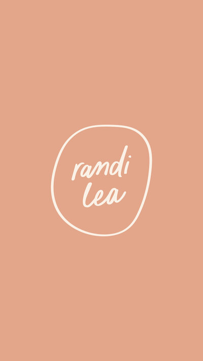 Randi Lea Photography logo on a light pink background