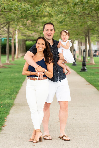 Hoboken NJ Jersey City Family Photographer, husband wife, mother father, mother daughter, father daughter, NYC, New York City, Hoboken, Jersey Shore, labor day pictures, spring pictures, newborn pictures, happy family, blue, white pants, nature photography