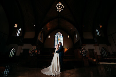 photo of newlyweds inside of Lee University chapel